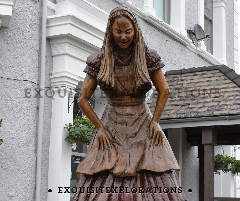 Alice statue in Llandudno, Wales; Searching for Alice by exquisitEXPLORATIONS Travel Blog