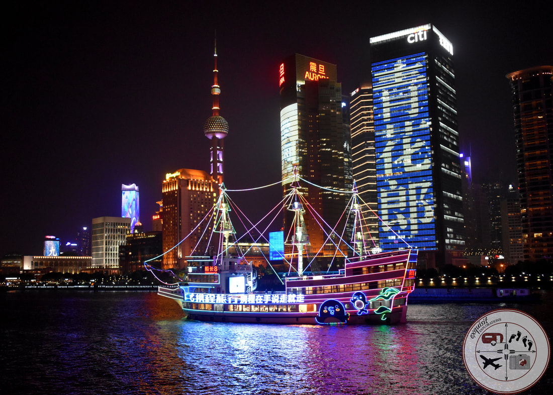 Neon-Lit Boats Dot the Huangpu River Scene; Shanghai, China; New Shanghai; Photos to Inspire your Wanderlust