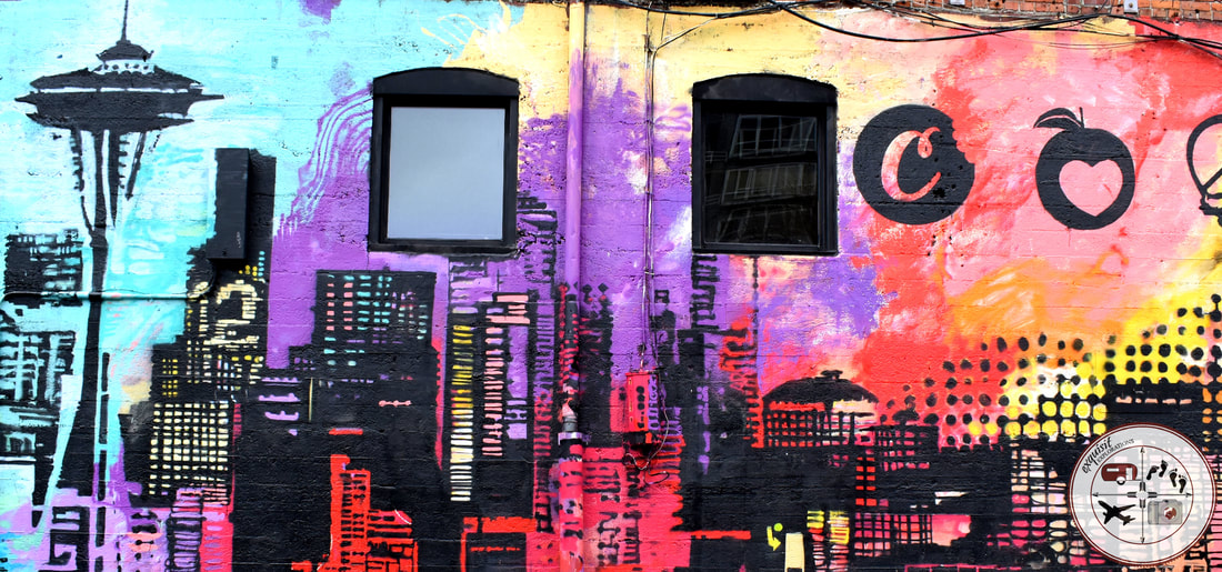 Seattle, WA; Street Art Around the World; colorful murals, Seattle skyline